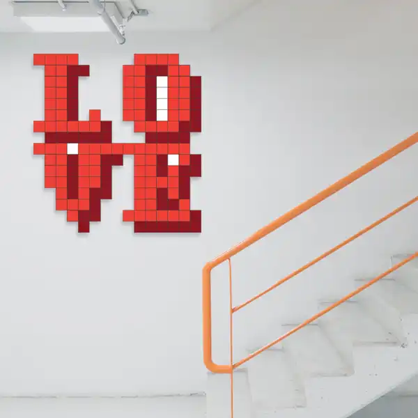Pixelated text spelling out 'LOVE' in blocky, red square-shaped letters